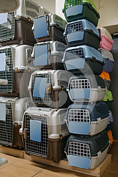 Inside petshop, pet carriers for dogs and cats