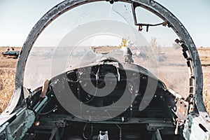 Inside pilot cabin of L-29 plane broken windshield photo