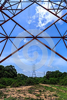 Inside of a power pylon and look into the sun