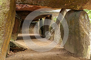 Inside a prehistoric burial chamber or Dolmen La Roche aux Fees