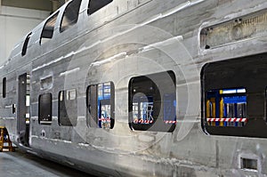 Inside of the rail car assembly plant. Industrial workshop for welding aluminum bodys. Factory of the manufacturing train sets