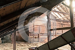 Inside Rustic Wooden Old Barn Hay Bales Straw Sunlight Rays Light Beams Farm