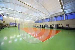 Inside school gym hall and volleyball net