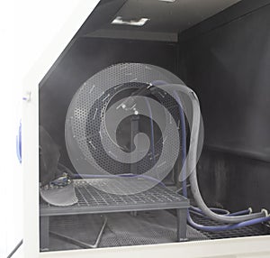 Inside Shot blasting machine. Machine for Shot blasting of objects. Industrial