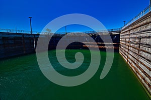 Inside the soo locks in Sault ste marie michigan waiting for the water to rise to superiors depth