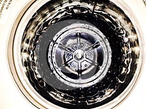 Inside the steely interior of a washing machine