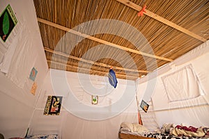 The inside of a sukkah is covered with a white sheet in Jerusalem