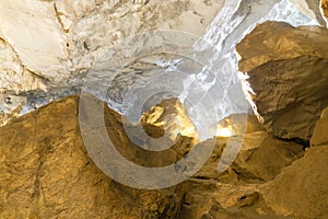 Inside the Sung Sot Cave Surprise Grotto in Ha Long Bay with thousands of stalactites and stalagmites