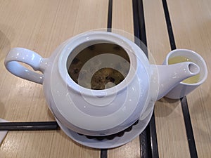 Inside of teapot contain chrysantemum tea photo