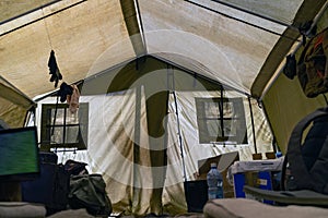 Inside the tent of the geological expedition. The work of the expedition in the forest, life inside the tent