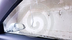 Inside View from a Car at a Self-Service Wash Station