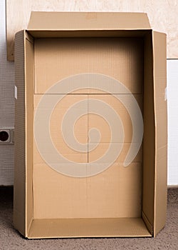 Inside view of empty brown cardboard box. Packaging for transportation