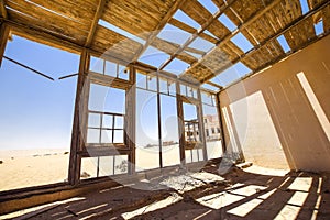 Inside view of one of the abandoned houses in the ghost town of Kolmanskop near LÃ¼deritz in Namibia