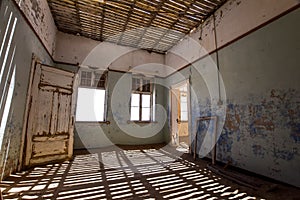 Inside view of one of the abandoned houses in the ghost town of Kolmanskop near LÃ¼deritz in Namibia