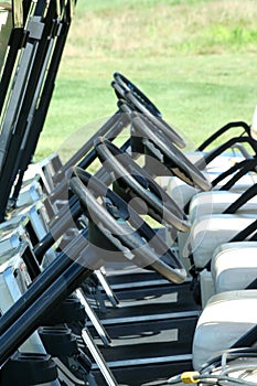 Inside view of a row of golf carts