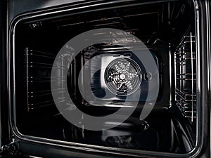 inside view of the surface of an electric oven with a fan and grill, convection modes for cooking, pyrolytic cleaning of the stove