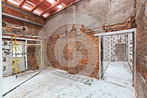 Inside view of working process of building house with wall made from foamed concrete block and metal platform. Concept