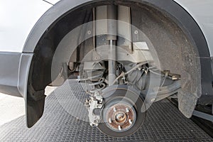 The Inside Of The Wheel Arch Of A Silver Car