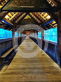 Inside wooden bridge wiyh blue light