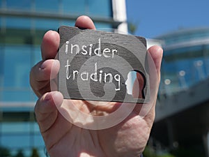 Insider trading is shown on the conceptual business photo