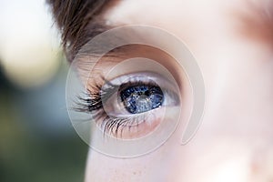 Insightful look blue eyes boy