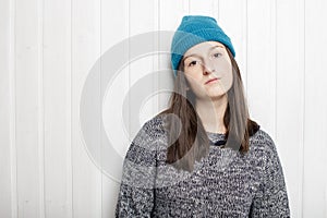Insolent arrogant young girl in a hat photo