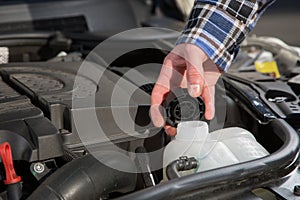 Inspect a car Engine water canister