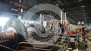 Inspection and assembly of a giant industrial turbine after repair