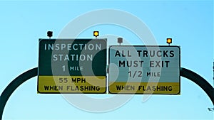 Inspection signs on the interstate in Texas.