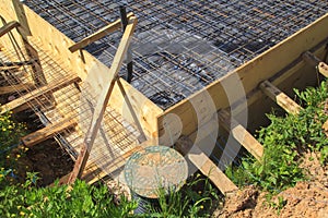 inspection well and trench with wooden formwork