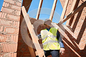 Inspector checking compliance with safety regulations at the construction site