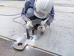 Inspector checking defect in welded with process Magnetic Particle Testing& x28;MT& x29; of Non-Destructive Testing& x28;NDT& x29; photo