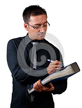 Inspector with checklist and documents on white