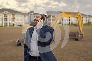 inspector of construction engineering with phone. inspector of construction engineering