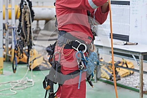 Inspector man wearing rope access equipment