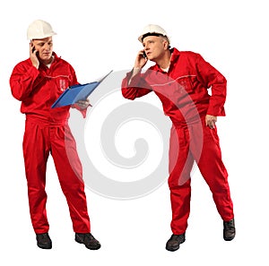 Inspector in red uniform and white hardhat at work