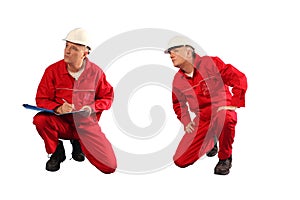 Inspector in red uniform and white hardhat at work