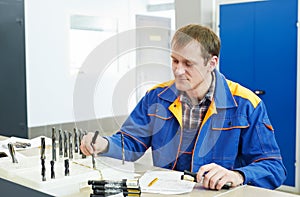Inspector worker at factory manufacturing