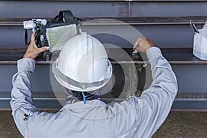 Inspectors are Inspection defects in Welded Steel H-beam add joints with Process Ultrasonic Testing (UT)