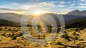 Inspiration background image of sunrise above mountain ranges.