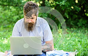 Inspiration for blogging. Looking for inspiration. Blogger becoming inspired by nature. Man bearded with laptop sit