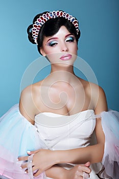 Inspiration. Fashion Model with Dramatic Theatrical Makeup and Diadem