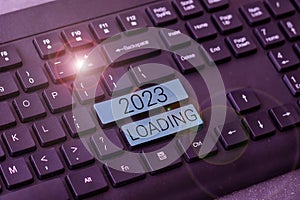 Inspiration showing sign 2023 Loading. Concept meaning Advertising the upcoming year Forecasting the future event