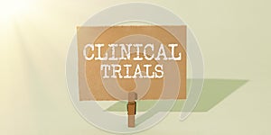 Inspiration showing sign Clinical Trials. Internet Concept Research investigation to new treatments to people