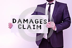 Inspiration showing sign Damages Claim. Business overview Demand Compensation Litigate Insurance File Suit photo