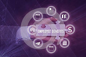 Inspiration showing sign Employee Benefits. Business approach Indirect and noncash compensation paid to an employee Hand photo