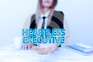 Text caption presenting Heartless Executive. Business approach workmate showing a lack of empathy or compassion photo