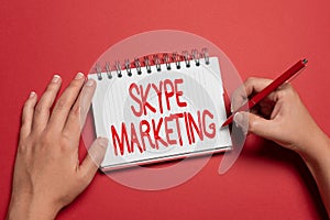 Inspiration showing sign Skype Marketing. Word Written on apps that specializes in providing video chat and voice