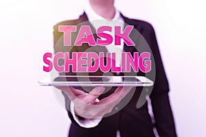 Inspiration showing sign Task Scheduling. Concept meaning The assignment of start and end times to a set of tasks