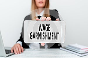 Inspiration showing sign Wage Garnishment. Internet Concept Deducting money from compensation ordered by the court